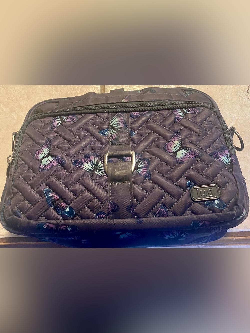 Lug Carousel XL crossbody bag dark quilted purple with colorful butterflies